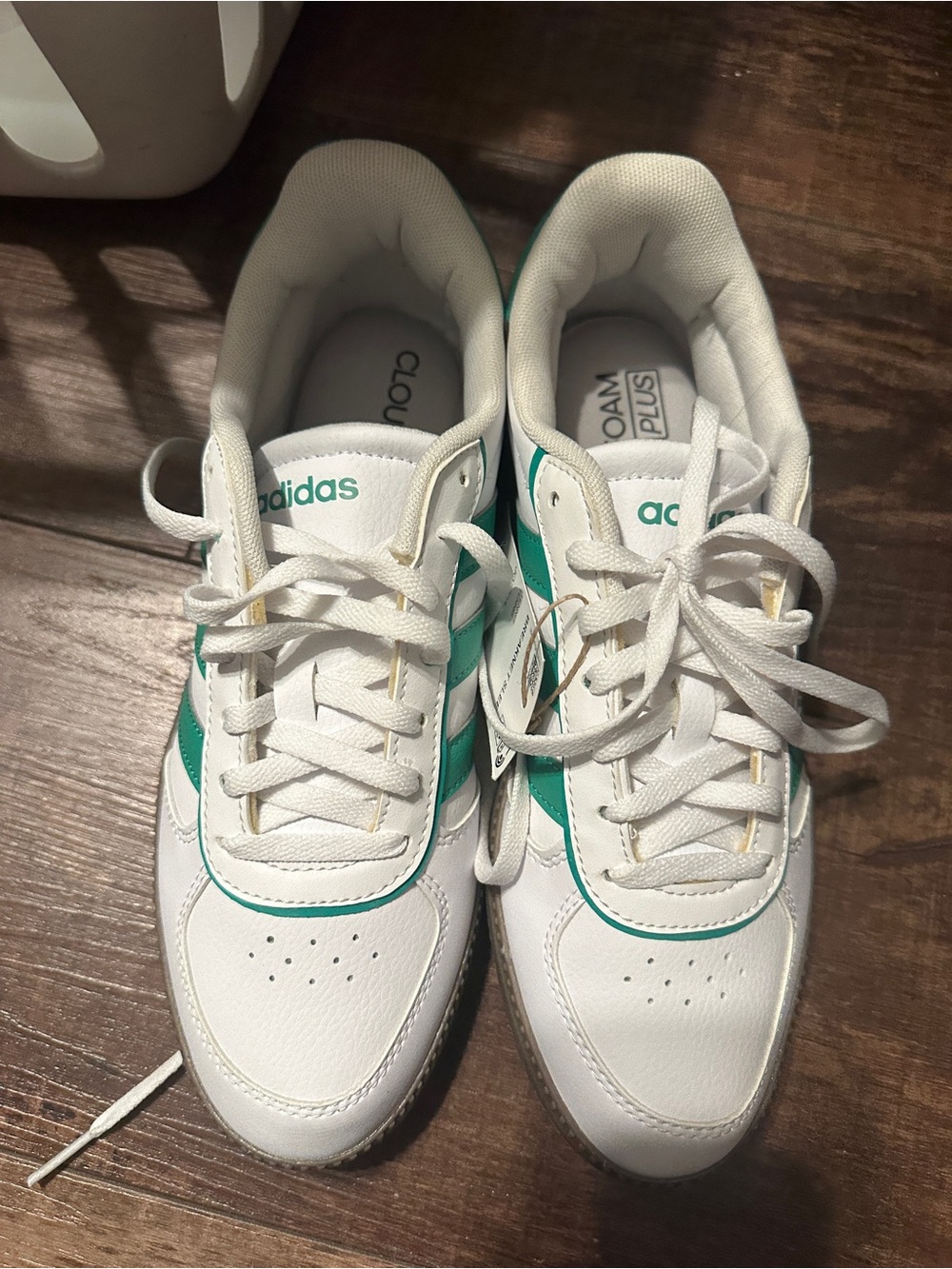 adidas Women’s White Sneakers with Teal Stripes